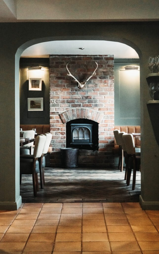 The restaurant's brick chimney with antlers above the wood-burning stove