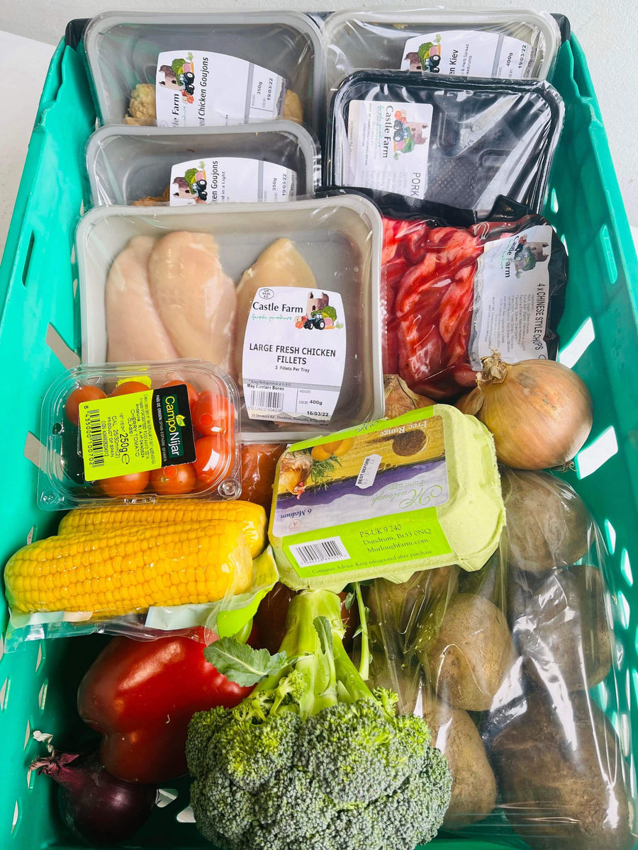 A Castle Farm food box filled with vegetables, eggs and meat