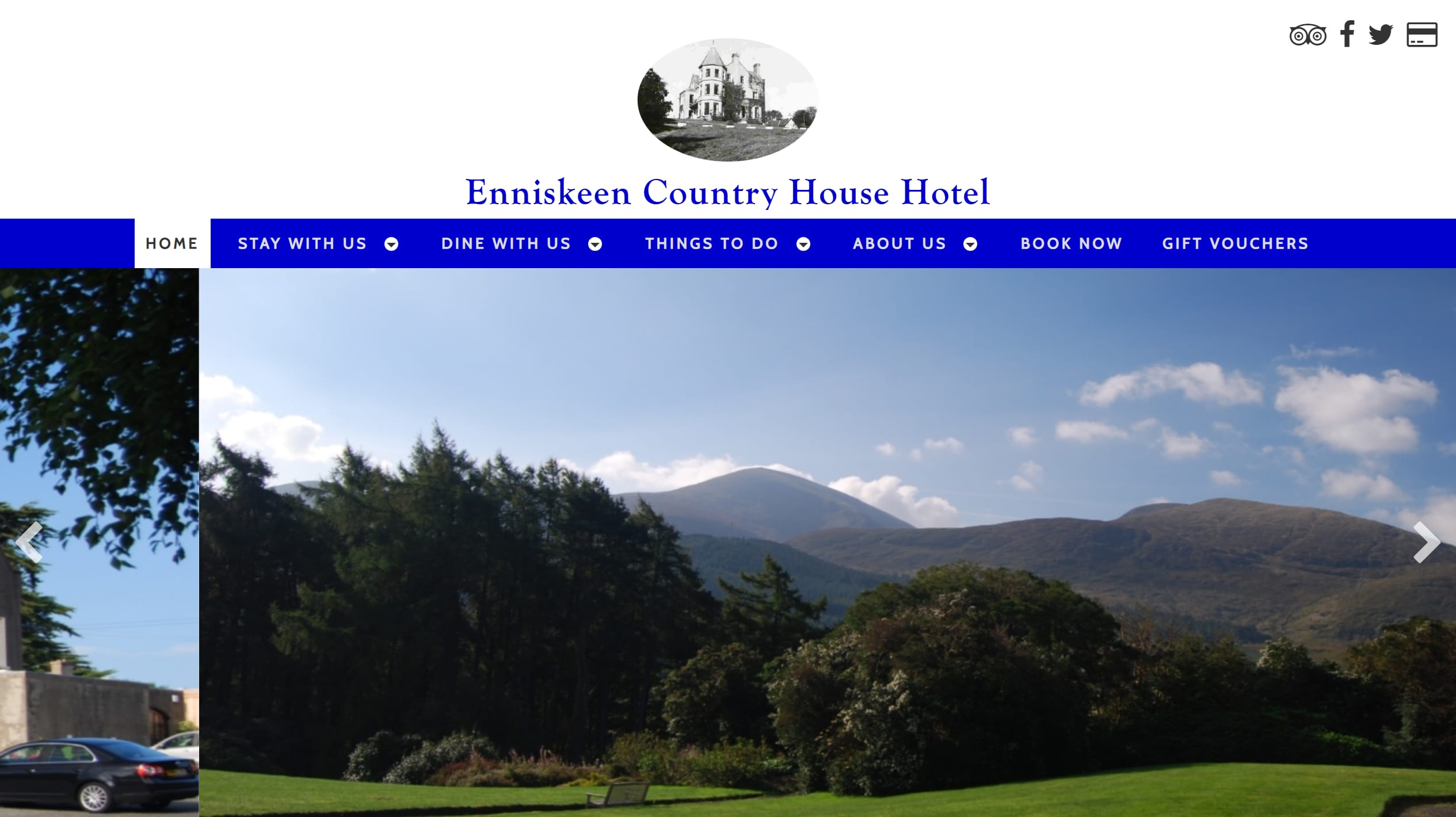 Enniskeen's current homepage with an archive oval logo, blue uppercase menu bar and a photo carousel of the house and valley, arrival cookie prompt closed