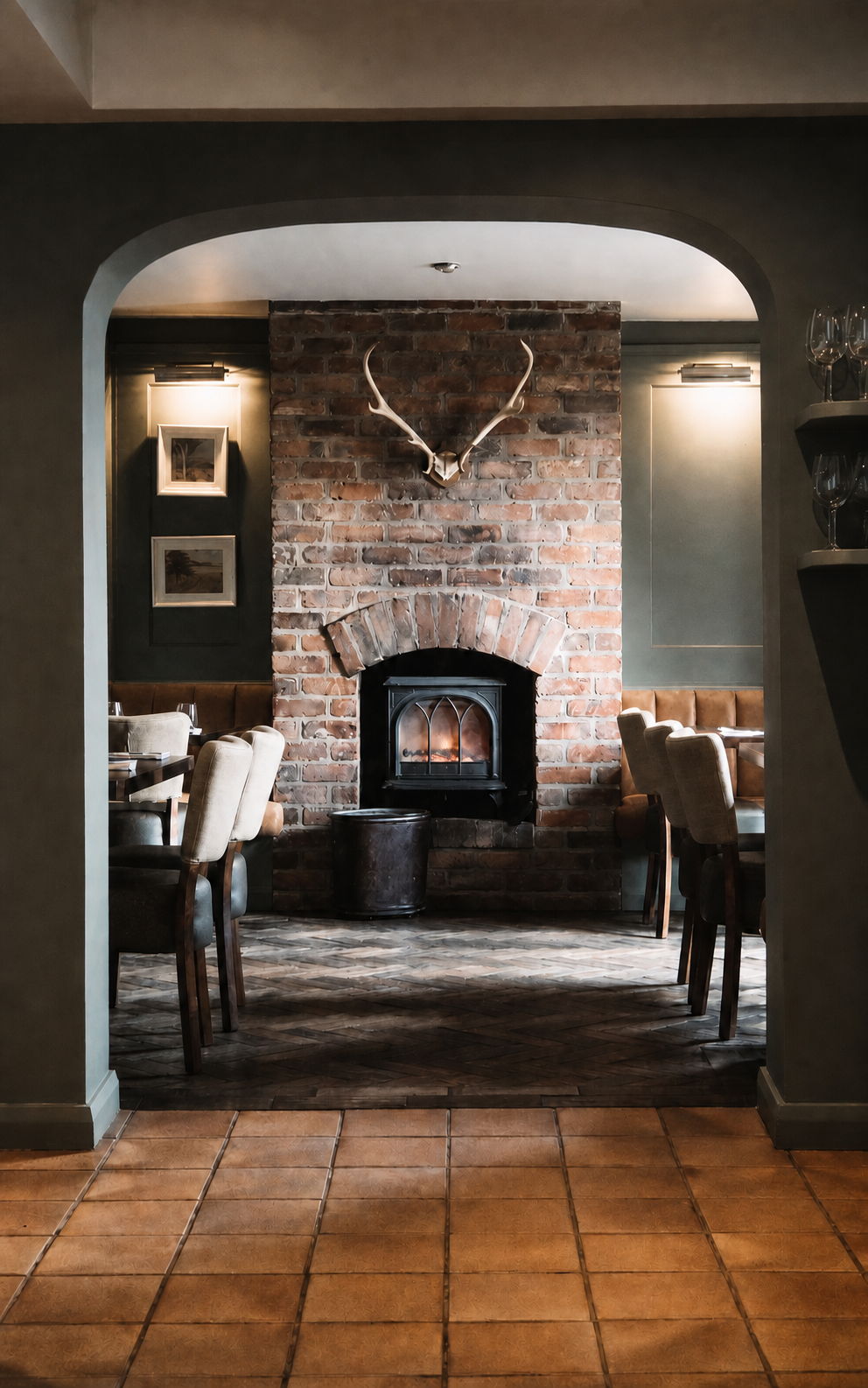 AI-generated faithful visualisation of the restaurant's rounded arch, brick chimney, antlers and lit wood-burning stove