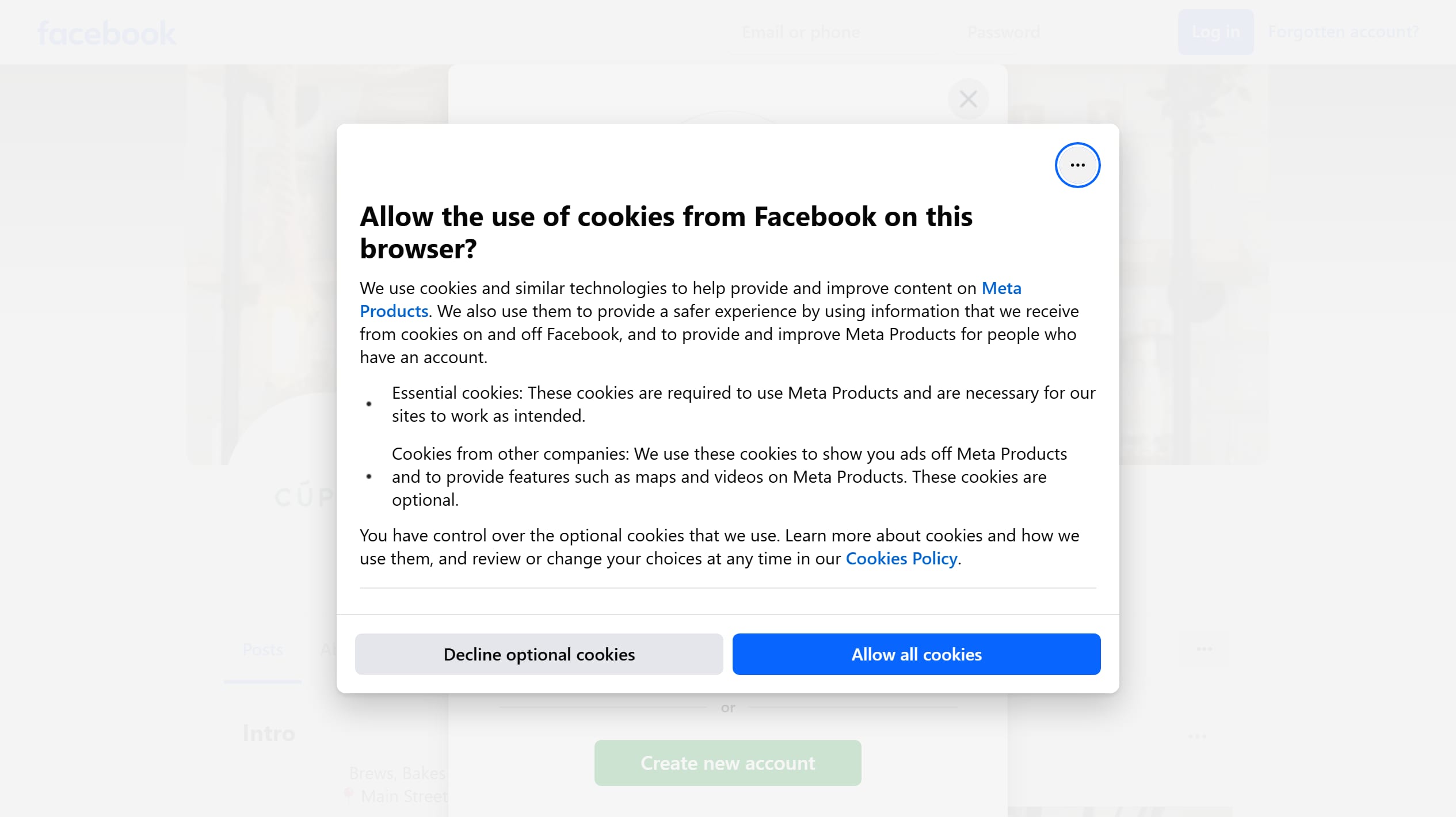Cúpla's current public presence: its Facebook page covered by Meta's cookie consent dialog and login form, with the café's name and tagline greyed out behind them